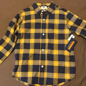 Boys button up long sleeved plaid shirt.